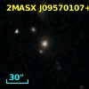 2MASX J09570107+2609410