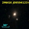 2MASX J09594123+1404122