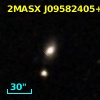 2MASX J09582405+1021459