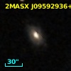 2MASX J09592936+1112029