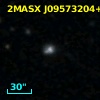 2MASX J09573204+0304385