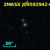 2MASX J09592942+0311018