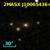 2MASX J10065436+0143016
