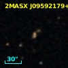 2MASX J09592179+0020278