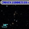 2MASX J10002518+0014575