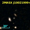2MASX J10021999+0004137