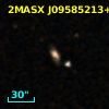 2MASX J09585213+0137133