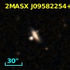 2MASX J09582254+0135047