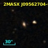2MASX J09562704-0028314