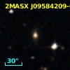 2MASX J09584209-0048223