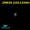 2MASX J10113340+2858416