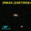 2MASX J10073958+0011075