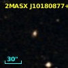 2MASX J10180877+0000589