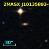 2MASX J10135893-0057054