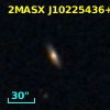 2MASX J10225436+0303033