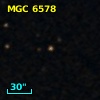 2MASS J10234635+0003550