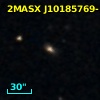 2MASX J10185769-1147259