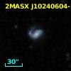 2MASX J10240604-2608112