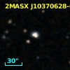 2MASX J10370628-0325035