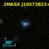 2MASX J10573823+3308569