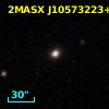 2MASX J10573223+1211499