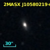 2MASX J10580219+0809425