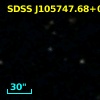 [VV2006c] J105747.7+033356