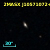 2MASX J10571072+0325236