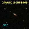 2MASX J10563965-0306548