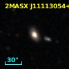2MASX J11113054+0317594