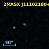 2MASX J11102180+0000457