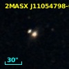 2MASX J11054798-0053097