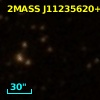 2MASS J11235620+2128575
