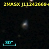 2MASX J11242669+1350564