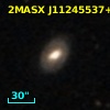 2MASX J11245537+0310068