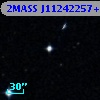 2MASS J11242257+0001057