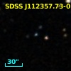 2MASS J11235773-0110276