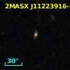 2MASX J11223916-0323289