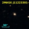 2MASX J11223301-0642370