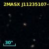 2MASX J11235107-0643018