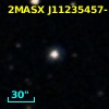 2MASX J11235457-1227080