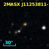 2MASX J11253811-1201304