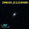 2MASX J11210589-2013431