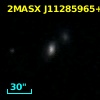 2MASX J11285965+1222038
