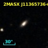 2MASX J11365736+0529229