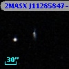 2MASX J11285847-0003297