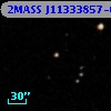 2MASS J11333857-0017043