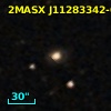 2MASX J11283342-0332232