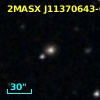 2MASX J11370643-0544240