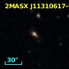 2MASX J11310617-0558295